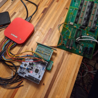 After locating key signals on the driver board, an STM32 demo board and a level shifter was used to interface with the remaining hardware.